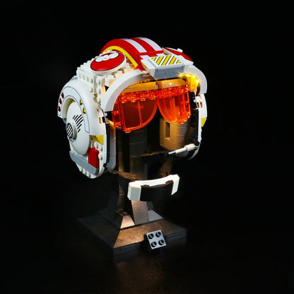 Lit helmet building block model photographed in low light