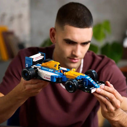 Close-up of the driver figure seated in the racing car cockpit