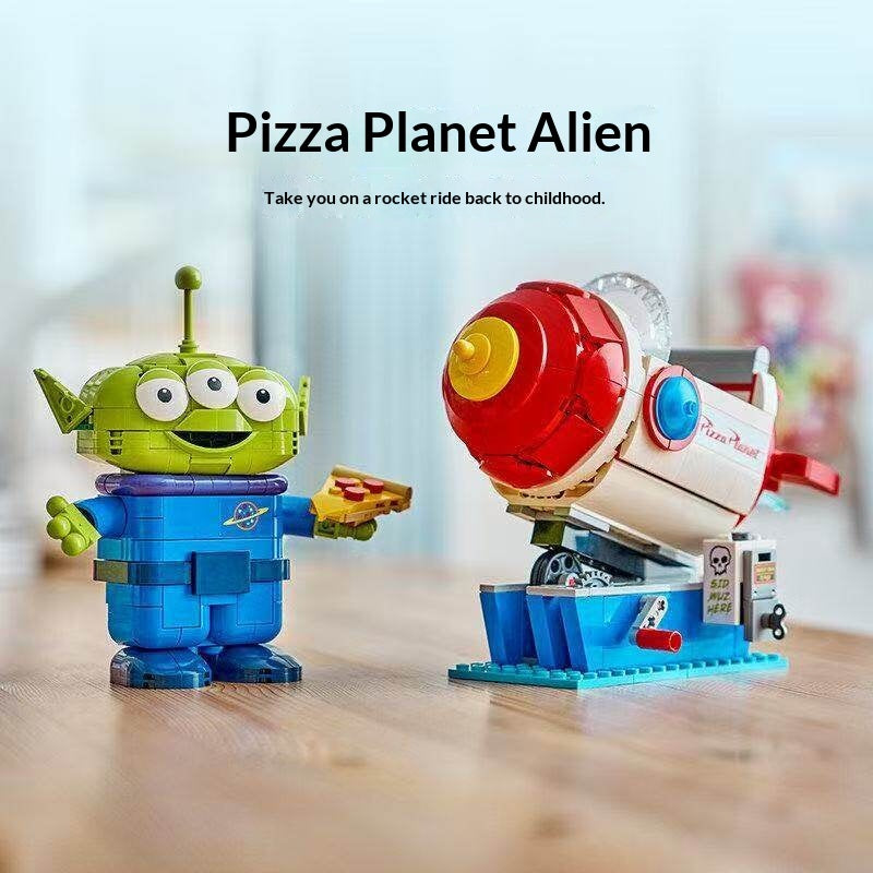 Close-up of the alien figure on the rocket ride