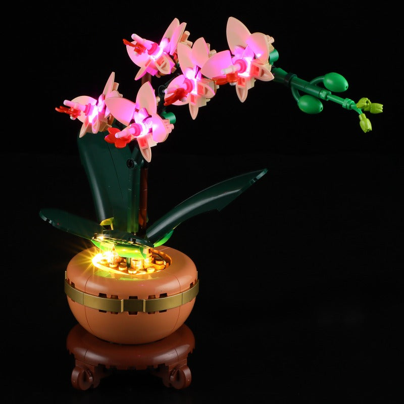 Orchid model displayed in its pot on a tabletop