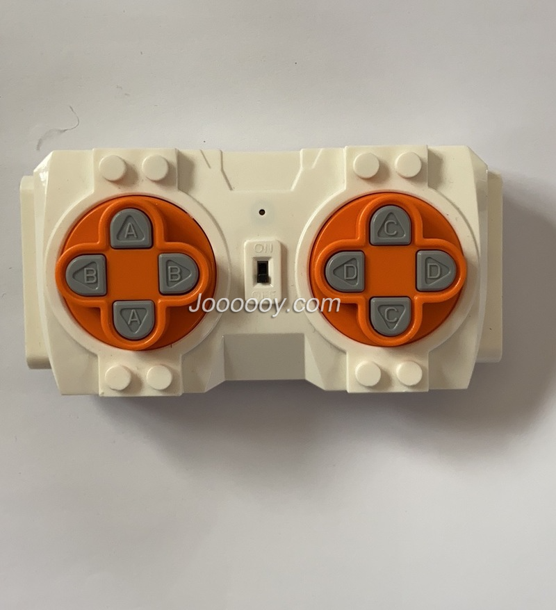 White remote for building block motor parts