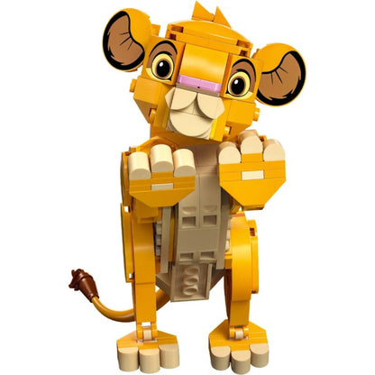 Close-up of the facial detail on the lion cub figure