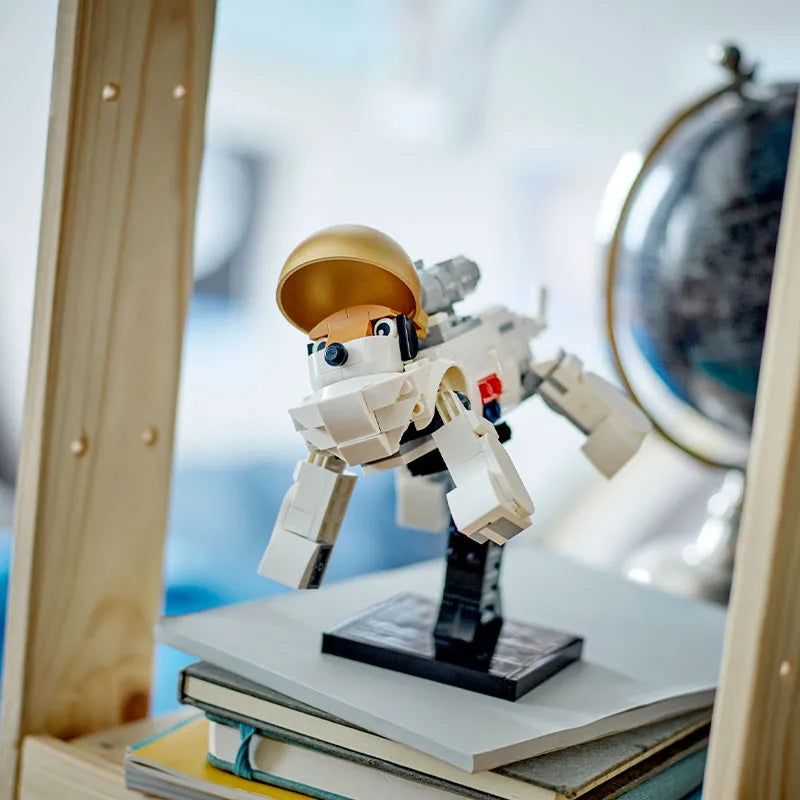 Astronaut brick figure posed on display stand